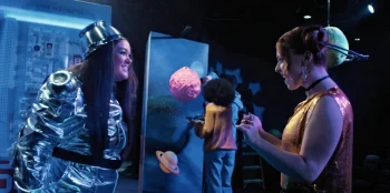 Jana Morrison as Lauren Nicholls and Kyra Leyroux as Aja Fox - How To Lose A Popularity Contest
