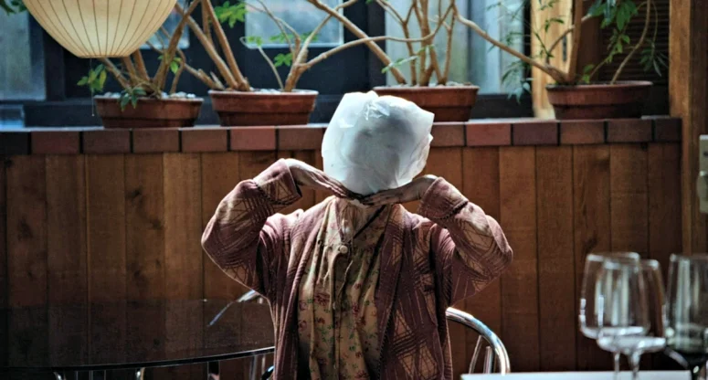 Baghead. Two actors are credited with playing this character: Cassandra Ebner and Tess Degenstein. - Keeper