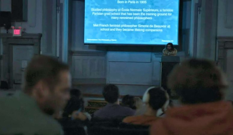 Text on screen in lecture hall - Private Eyes West Coast 102
