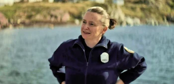 Willow Kean as Officer Lucy - The King Tide