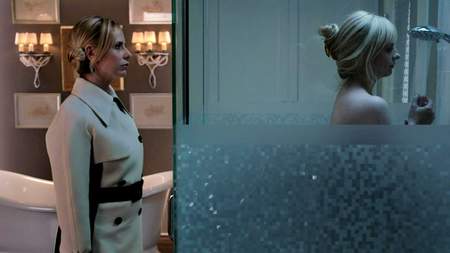 Siobhan silently watching Bridget shower